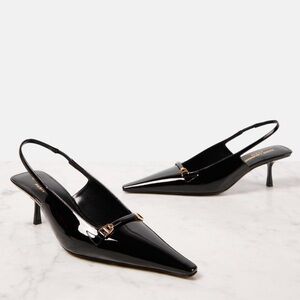 Saint Laurent
Women's Carine Slingback Pumps in Patent Leather black size 35